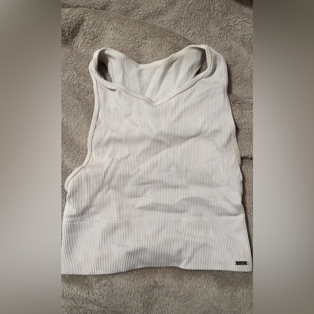 white workout top ribbed an expensive material